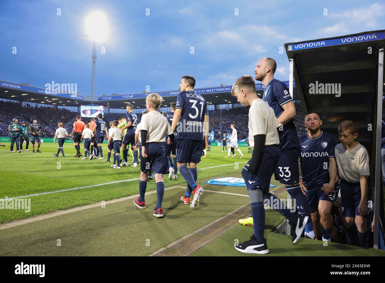 firo : 26.04.2024, football, football, 1.Liga, 1.Bundesliga, season 2023/2024, VfL Bochum 1848 - TSG Hoffenheim Entry of the teams into the floodlit game Ruhrstadion Stock Photo