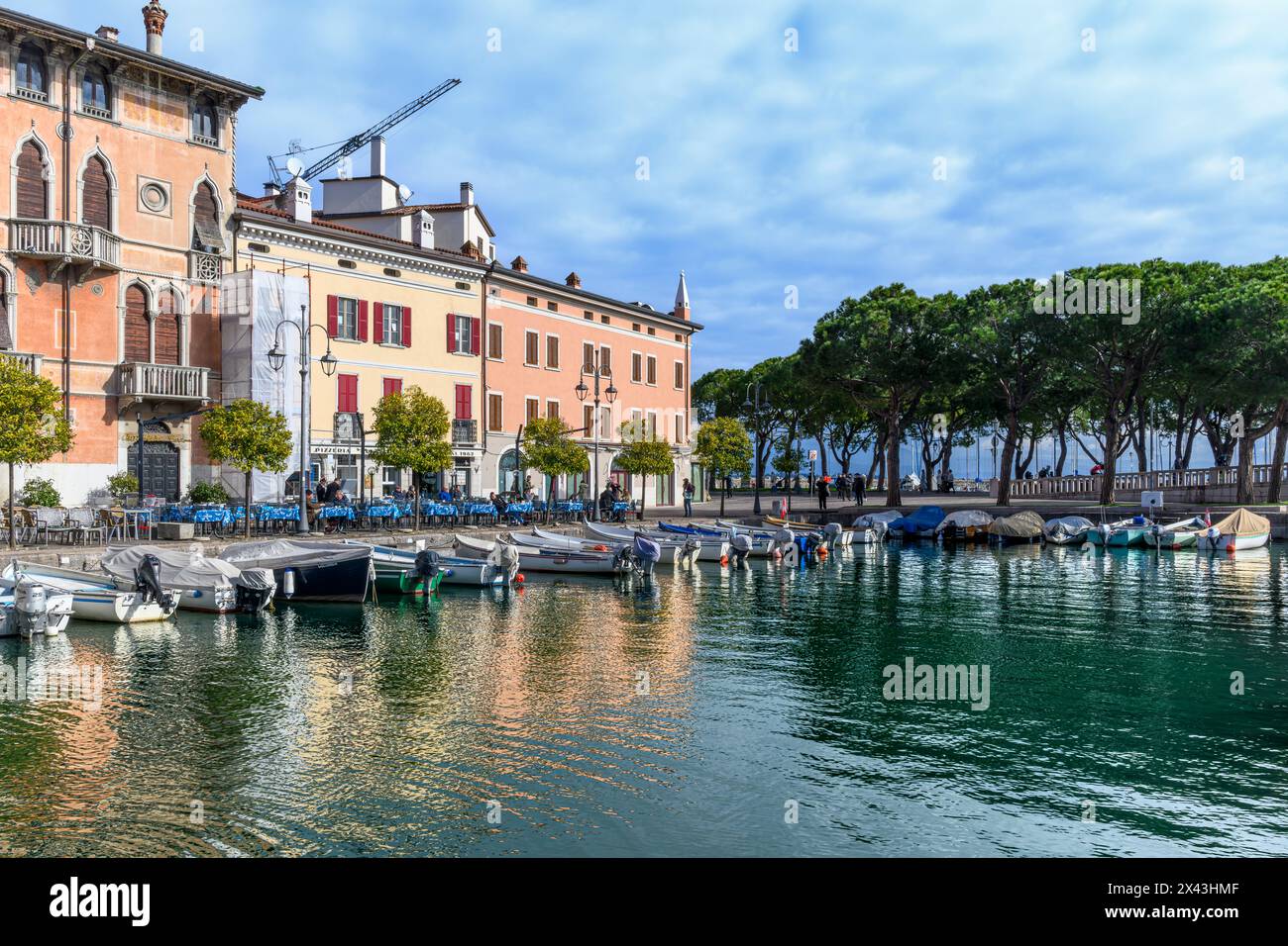 The Porto Vecchio (old port) in the Italian town of Desenzano del Garda. With an idyllic location on the southern shore of Lake Garda, Italy. Stock Photo