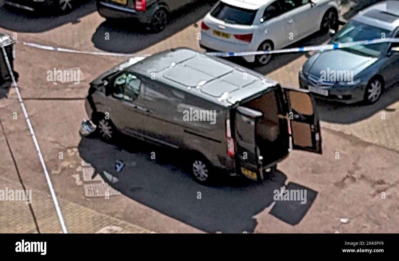 Police tape around a van on Laing Close in Hainault, east London following reported stabbings and attacks on police officers. A sword-wielding man has been arrested after witnesses spoke of shrieks and screams following reported stabbings and attacks. Five people were taken to hospital following the incident at around 7am on Tuesday, London Ambulance Service said. Picture date: Tuesday April 30, 2024. Stock Photo