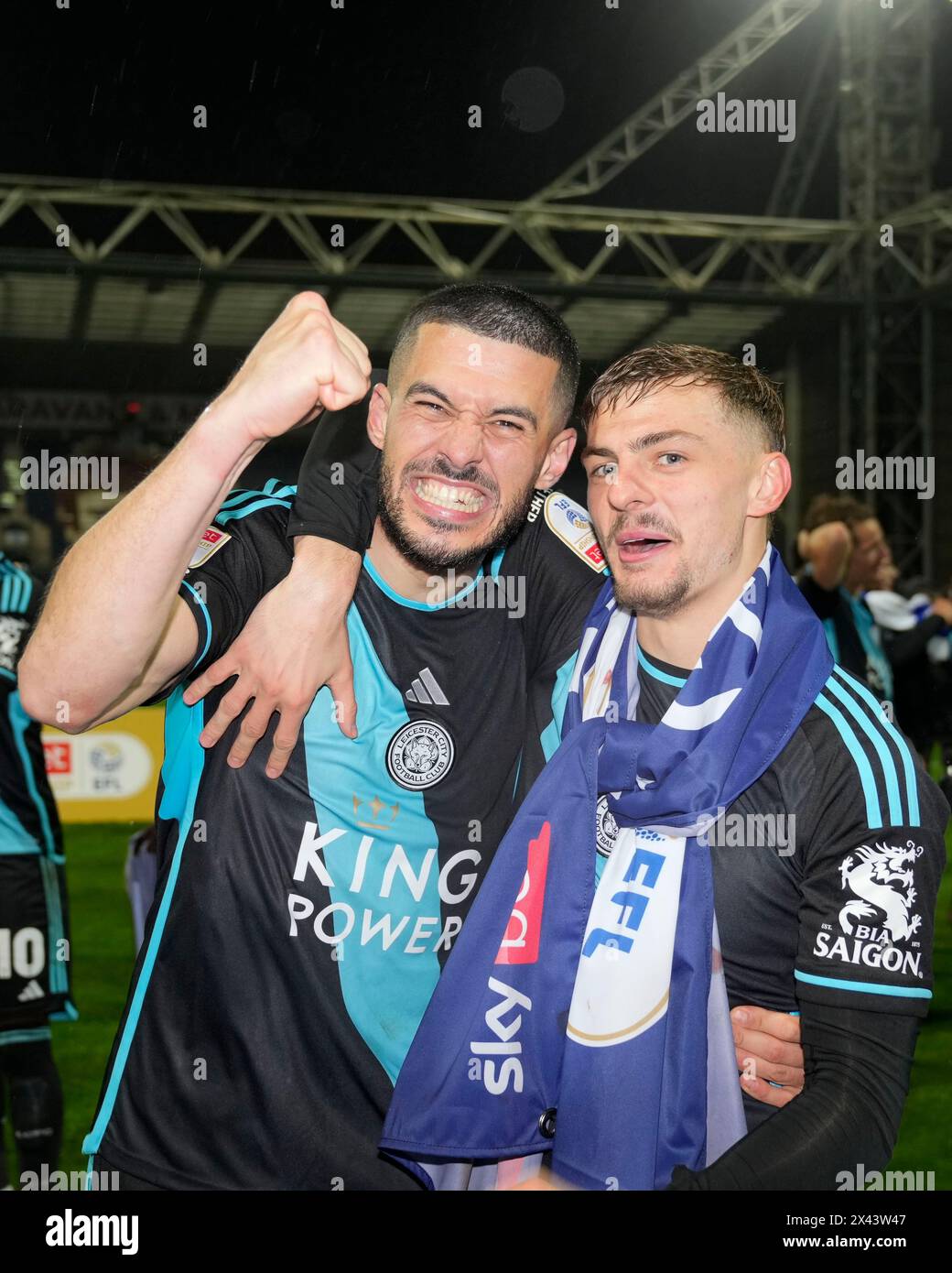Conor Coady of Leicester City and Kiernan Dewsbury-Hall of Leicester City celebrate after winning the Championship after the Sky Bet Championship match Preston North End vs Leicester City at Deepdale, Preston, United Kingdom, 29th April 2024  (Photo by Steve Flynn/News Images) Stock Photo