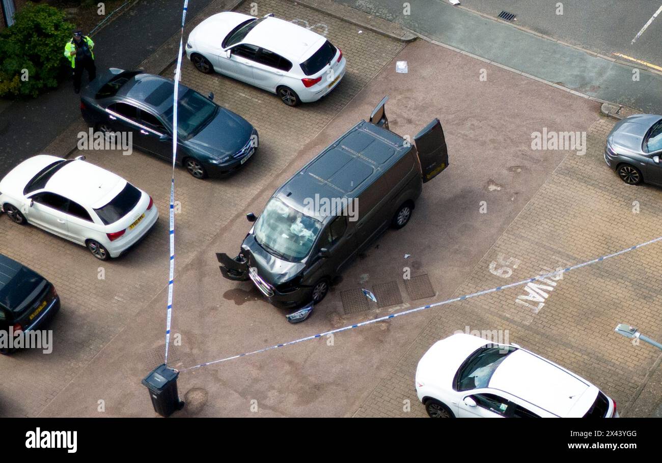 NUMBERPLATE PIXELATED BY PA PICTURE DESK Police tape around a van on Laing Close in Hainault, east London following reported stabbings and attacks on police officers. A sword-wielding man has been arrested after witnesses spoke of shrieks and screams following reported stabbings and attacks. Five people were taken to hospital following the incident at around 7am on Tuesday, London Ambulance Service said. Picture date: Tuesday April 30, 2024. Stock Photo