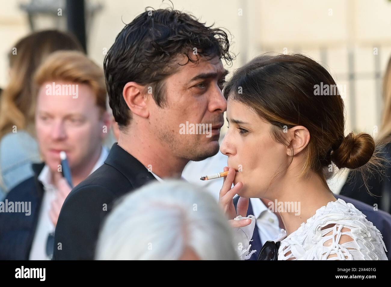 Riccardo Scamarcio (L) and Benedetta Porcaroli (R) surprised at an evening cocktail on the Barberini terrace in one of their rare social outings. Stock Photo