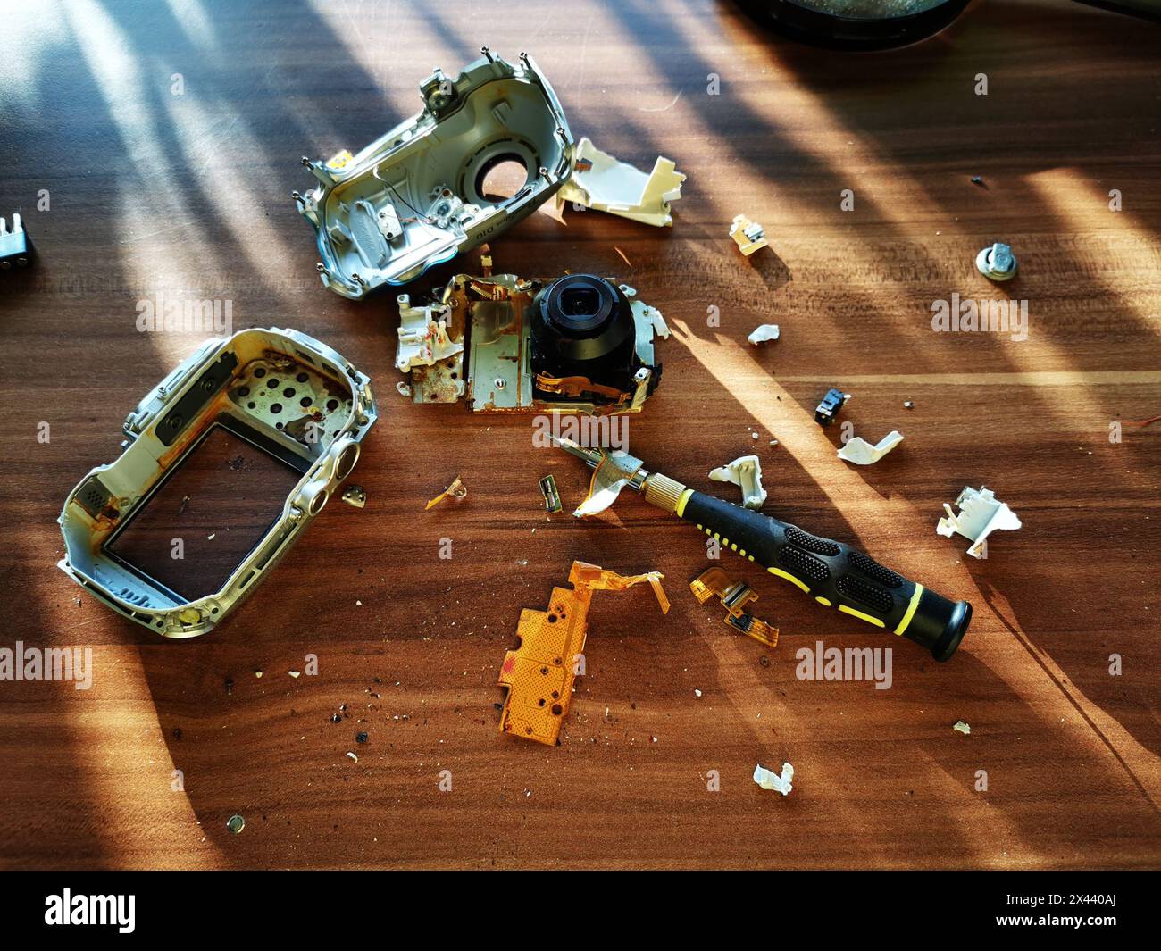 damaged photo camera as very nice technology background Stock Photo - Alamy