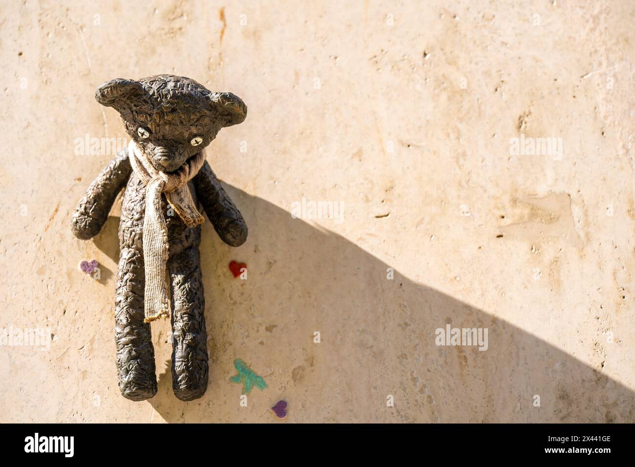 Budapest, Hungary - April 27, 2024: Bronze Mr. Bean's teddy bear mini sculpture by Mihaly Kolodko. Stock Photo