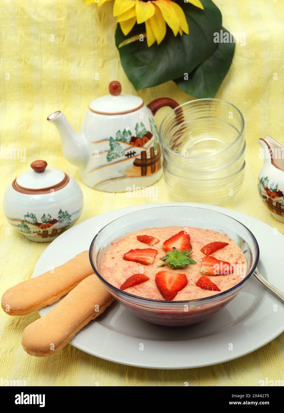 Strawberry Dessert, Bavarian cream in glass bowl. Stock Photo