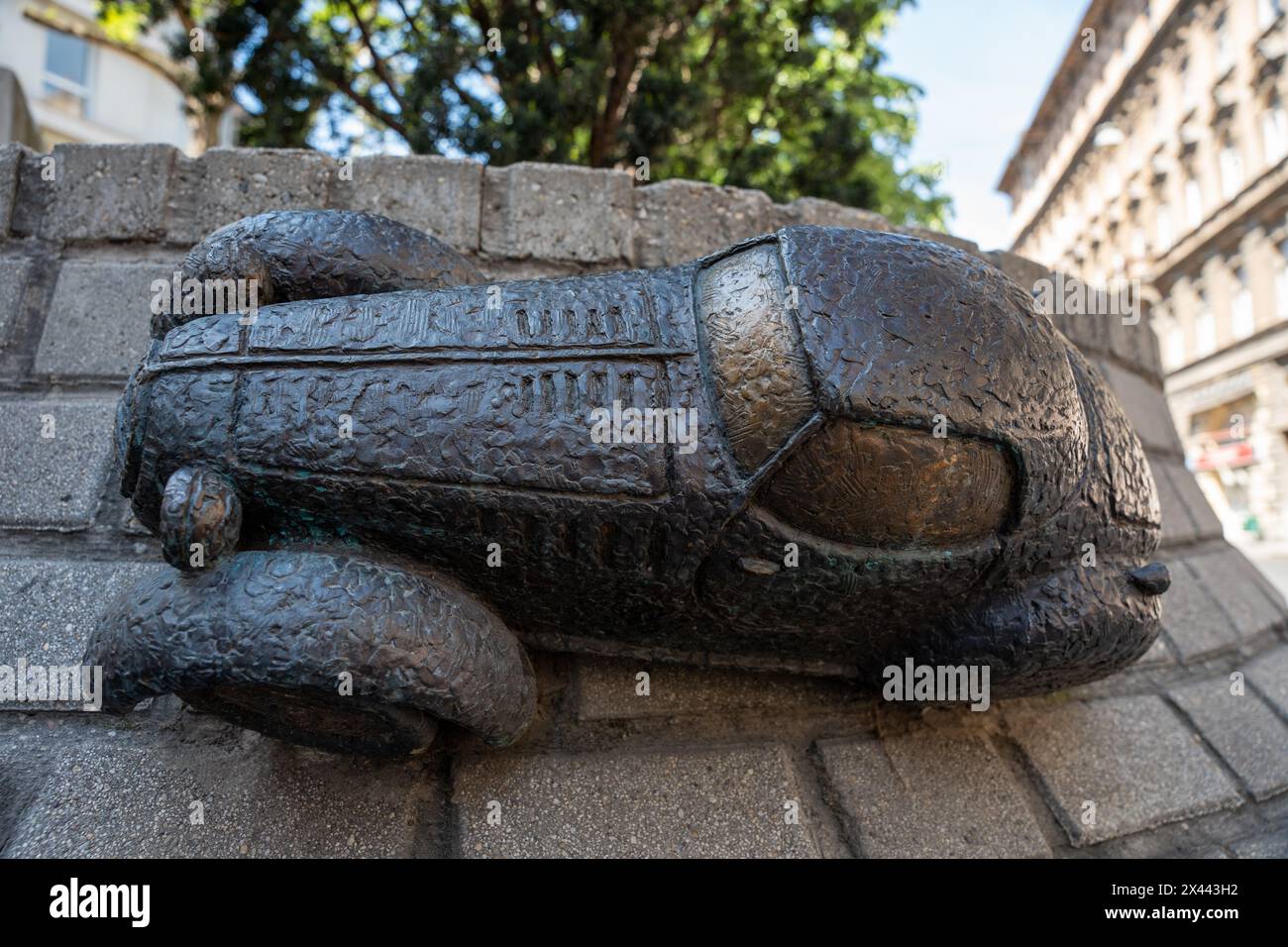 Budapest, Hungary - April 13, 2024: Kolodko Roadster car mini bronze sculpture. Stock Photo
