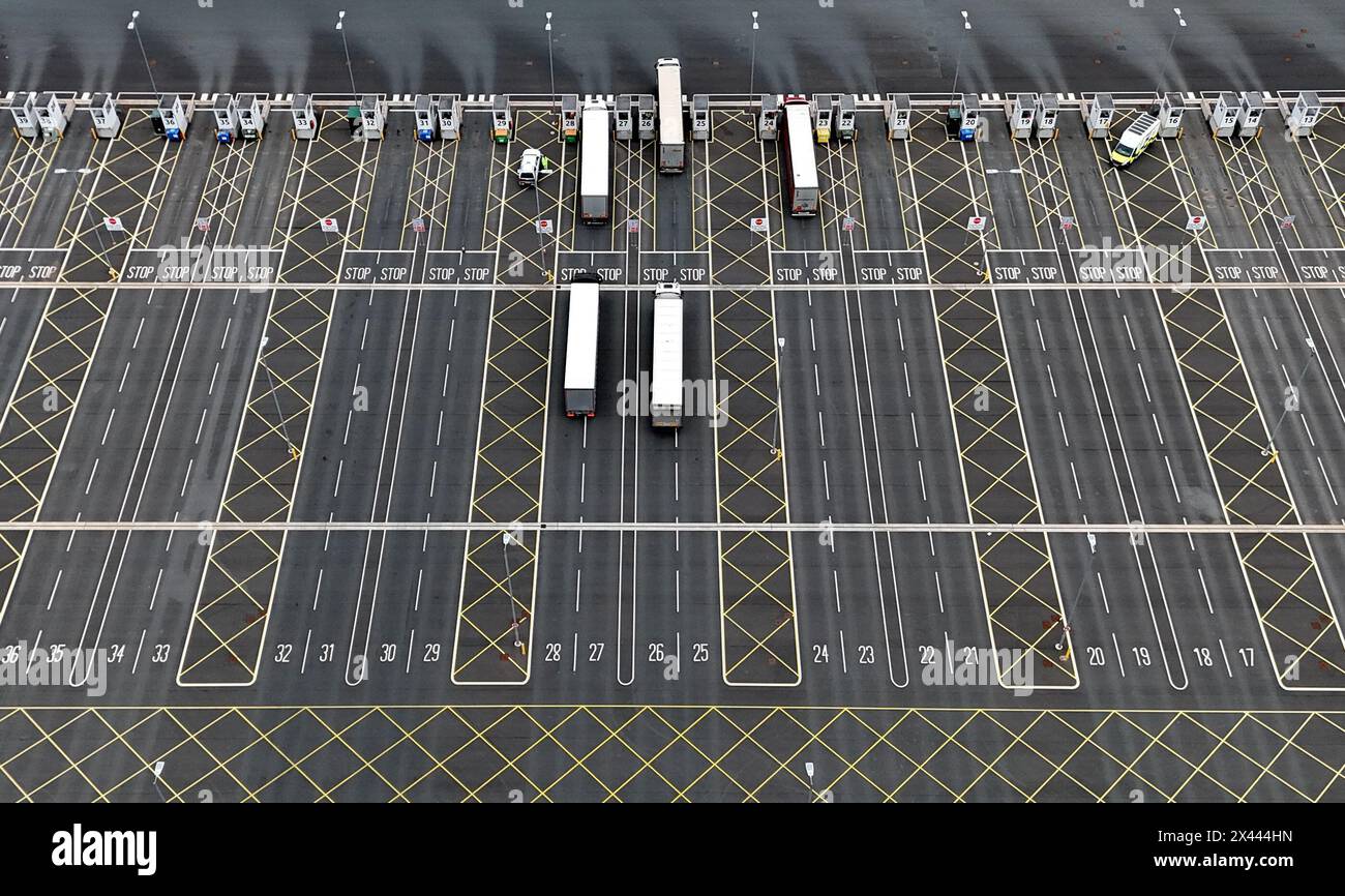 Lorries at the Sevington Inland Border Facility in Ashford, Kent, as physical, documentary and identity post-Brexit border control checks begin on medium and high-risk plant and animal imports from the EU, as part of the Border Target Operating Model (BTOM) plan. Picture date: Tuesday April 30, 2024. The introduction of post-Brexit border checks has been delayed several times over fears they could fuel inflation, but began to be introduced from the start of this year. Stock Photo