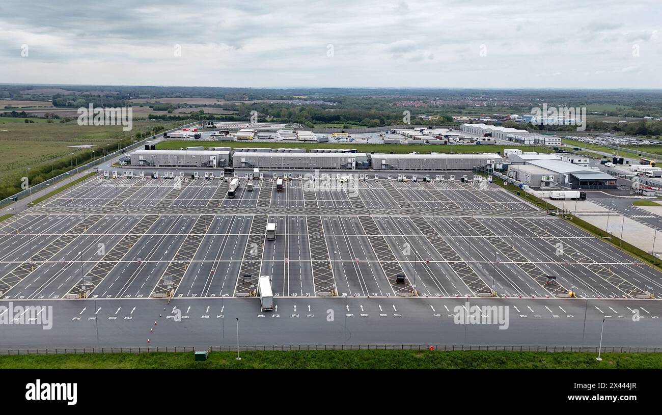 Lorries at the Sevington Inland Border Facility in Ashford, Kent, as physical, documentary and identity post-Brexit border control checks begin on medium and high-risk plant and animal imports from the EU, as part of the Border Target Operating Model (BTOM) plan. Picture date: Tuesday April 30, 2024. The introduction of post-Brexit border checks has been delayed several times over fears they could fuel inflation, but began to be introduced from the start of this year. Stock Photo