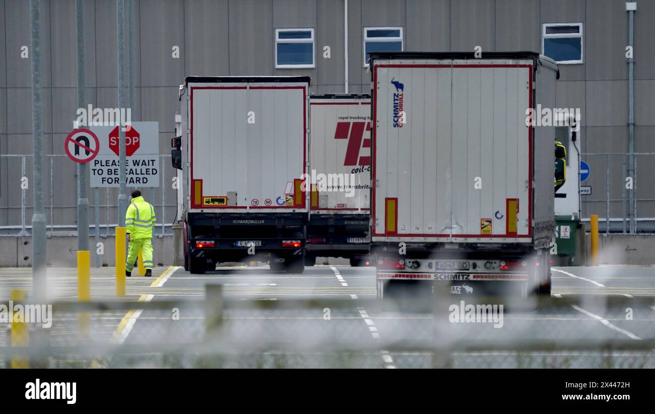 Lorries at the Sevington Inland Border Facility in Ashford, Kent, as physical, documentary and identity post-Brexit border control checks begin on medium and high-risk plant and animal imports from the EU, as part of the Border Target Operating Model (BTOM) plan. Picture date: Tuesday April 30, 2024. The introduction of post-Brexit border checks has been delayed several times over fears they could fuel inflation, but began to be introduced from the start of this year. Stock Photo