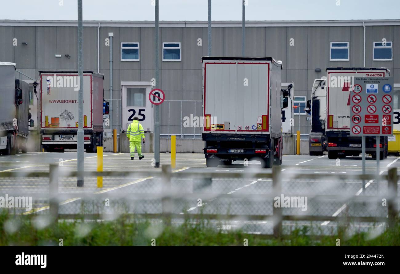 Lorries at the Sevington Inland Border Facility in Ashford, Kent, as physical, documentary and identity post-Brexit border control checks begin on medium and high-risk plant and animal imports from the EU, as part of the Border Target Operating Model (BTOM) plan. Picture date: Tuesday April 30, 2024. The introduction of post-Brexit border checks has been delayed several times over fears they could fuel inflation, but began to be introduced from the start of this year. Stock Photo