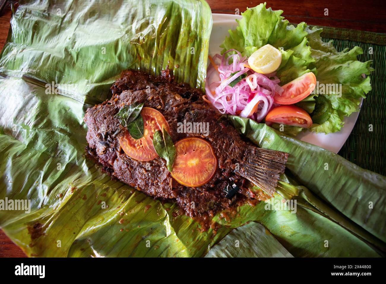 Striped cichlid, traditional Kerala dish, Kerala, India Stock Photo