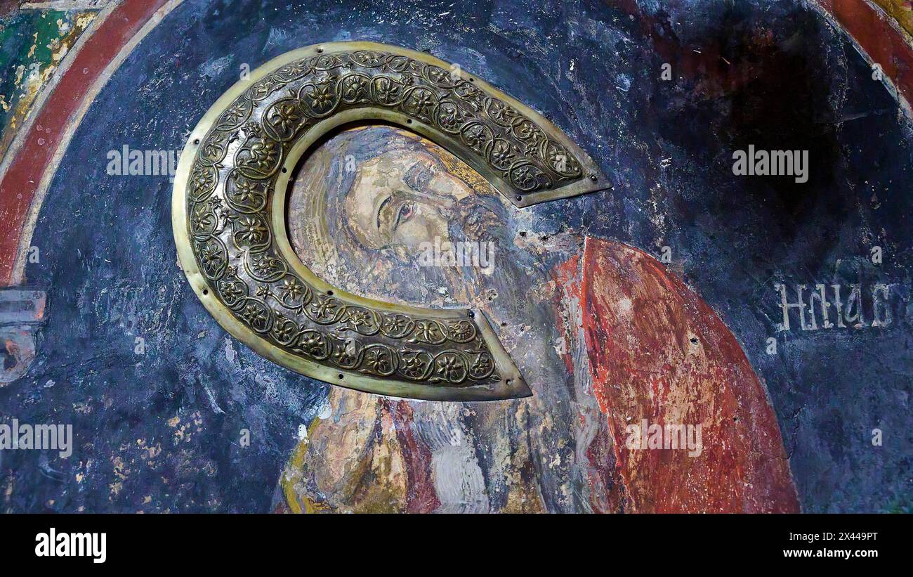 Detail of an Orthodox icon with a metallic letter and halo motif ...