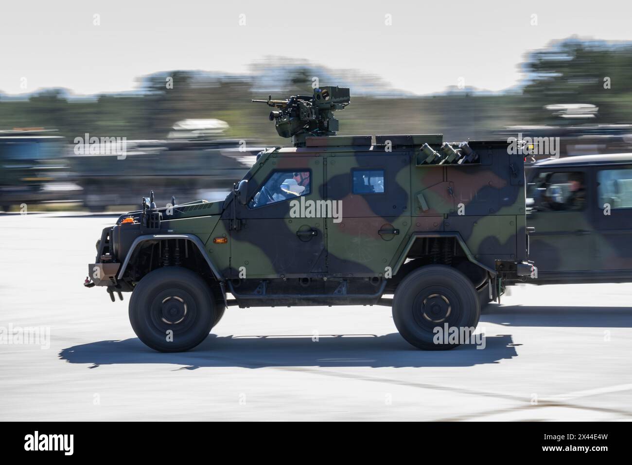 30 April 2024, Saxony, Weißkeißel: Bundeswehr soldiers drive along the ...