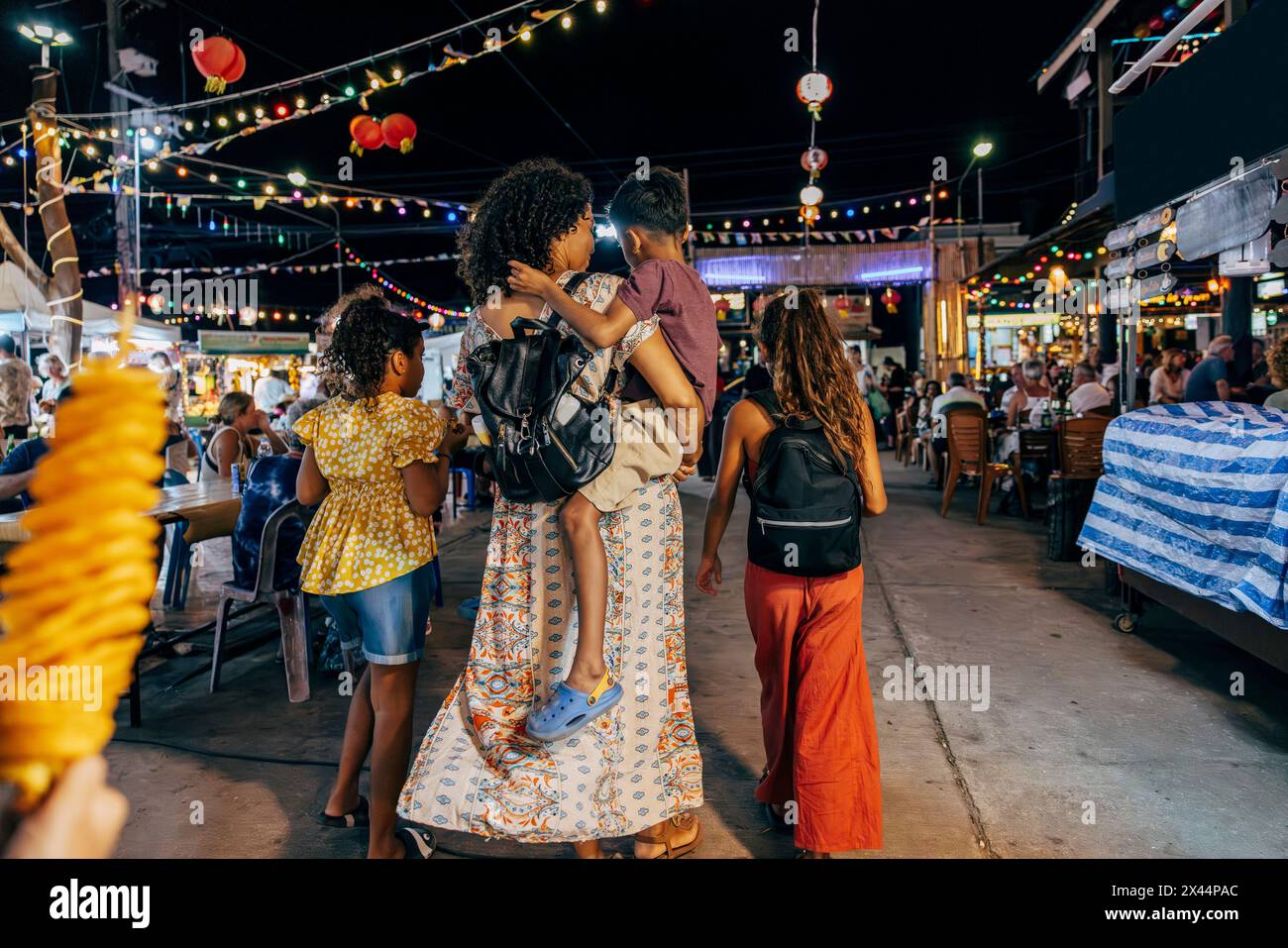 Woman street night rear view hi-res stock photography and images - Alamy