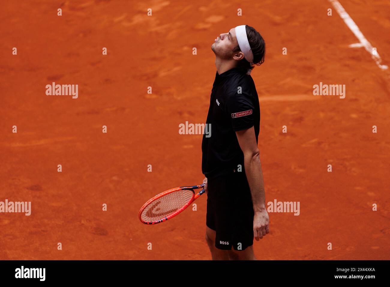 Madrid, Spain. 30th Apr, 2024. Taylor Fritz of US plays against Hubert Hurkacz ( not pictured ) of Poland on Day 9 of the Mutua Madrid Open 2024 tournament at La Caja Magica. Final score; Hubert Hurkacz 0:2 Taylor Fritz. Credit: SOPA Images Limited/Alamy Live News Stock Photo