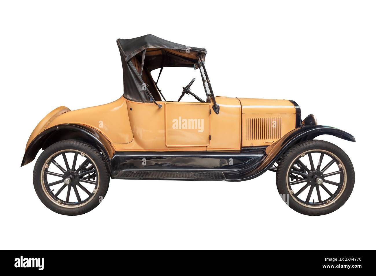Side view of an early twentieth century American car isolated on a white background Stock Photo