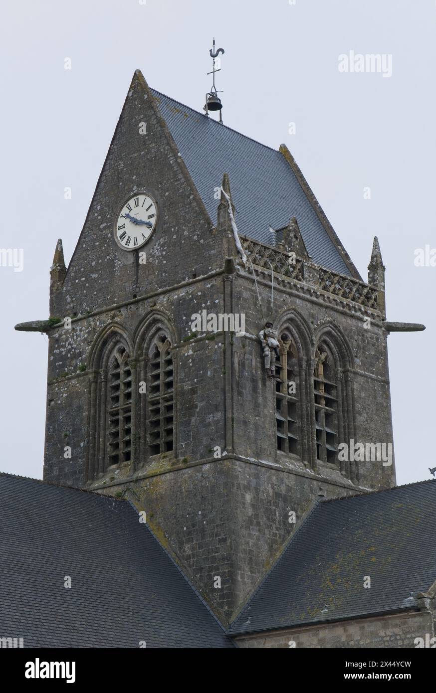 Sainte-Mere-Eglise, France - Apr 19, 2024: Sainte-Mere-Eglise church ...