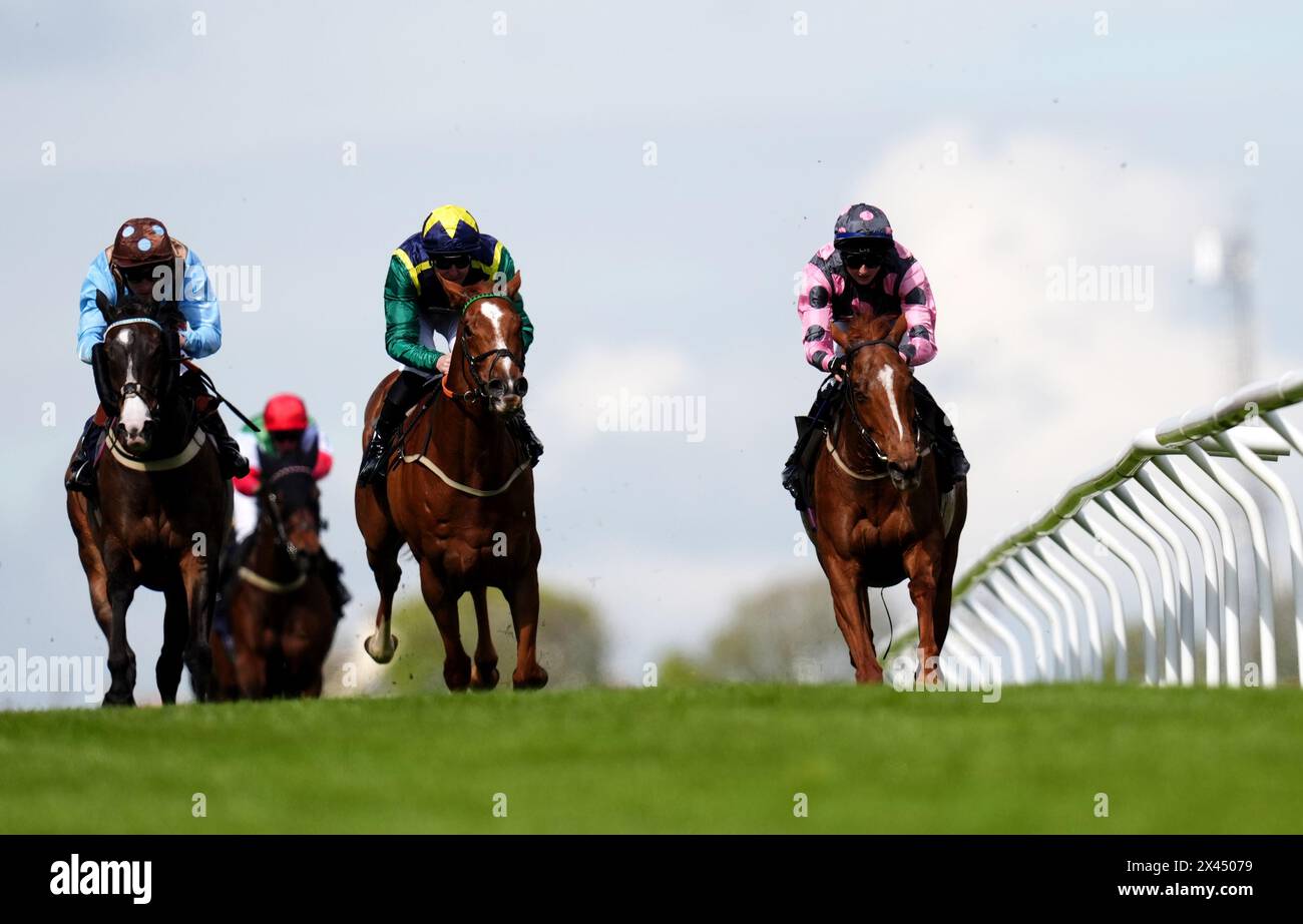 Cloudy Rose ridden by Cloudy Rose (right) on their way to winning the Streamline 202020 The Citys No 1 Handicap at Brighton Racecourse. Picture date: Tuesday April 30, 2024. Stock Photo