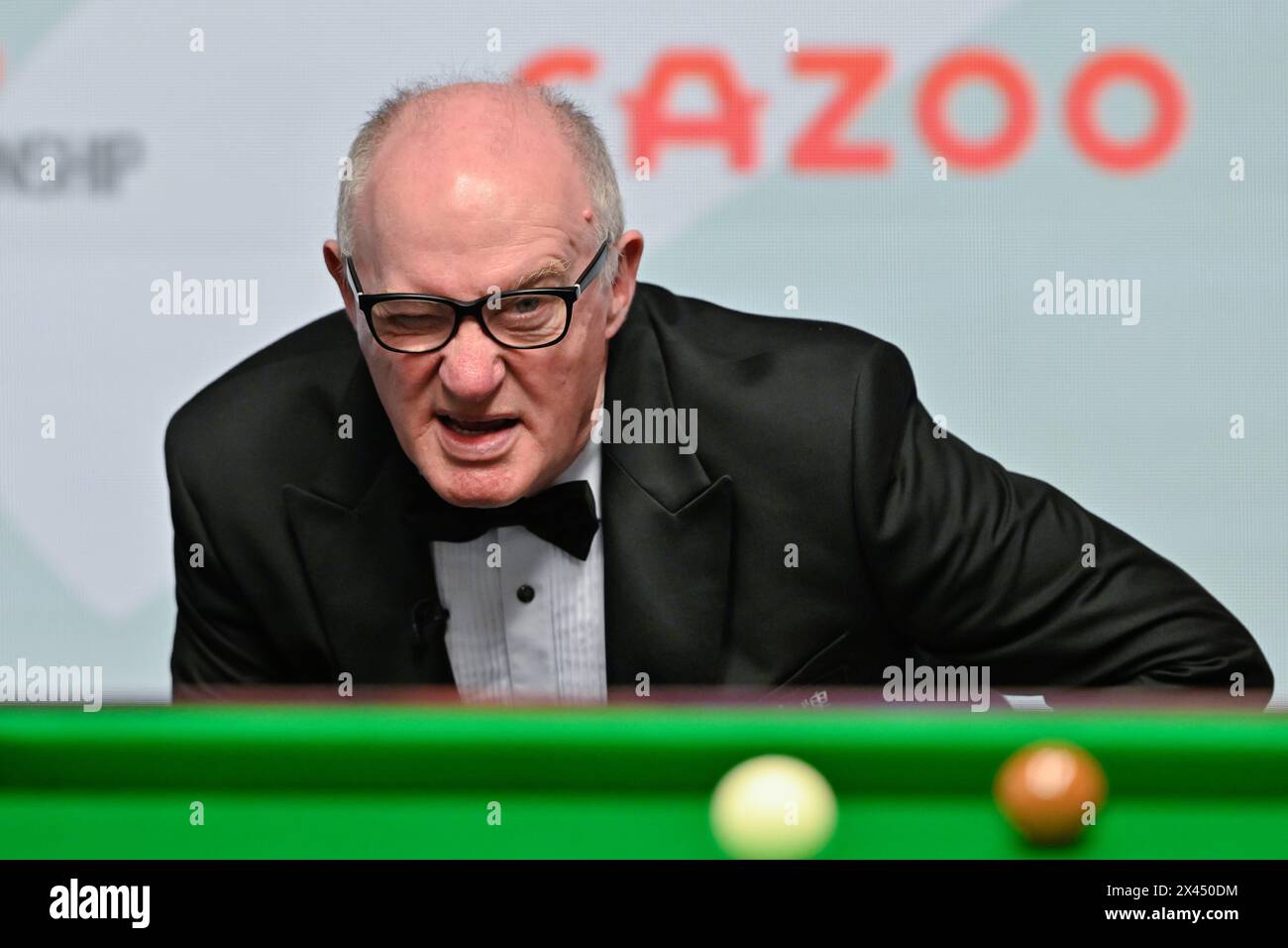 Referee Leo Scullion looks over the table, during the Cazoo World Championships 2024 at Crucible Theatre, Sheffield, United Kingdom, 30th April 2024  (Photo by Cody Froggatt/News Images) Stock Photo