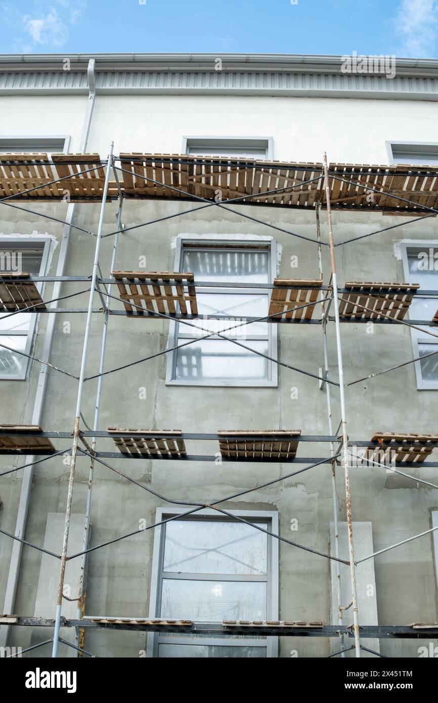 Scaffolding on the facade of a building under construction Stock Photo ...