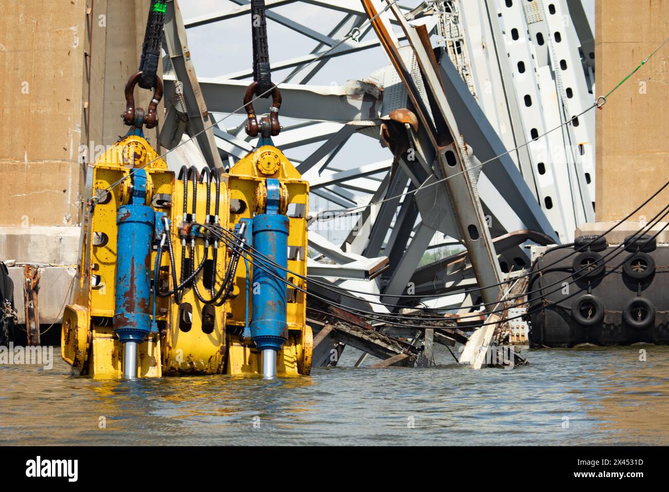 Dundalk, United States Of America. 28th Apr, 2024. Dundalk, United States of America. 28 April, 2024. Salvage crews use the HSWC500-1000 heavy duty hydraulic salvage grab claw attached to the massive Chesapeake 1000 heavy lift sheerleg crane ship as work continues to clear the wreckage of the collapsed Francis Scott Key Bridge, April 29, 2024, near Dundalk, Maryland. The bridge was struck by the 984-foot container ship MV Dali on March 26th and collapsed killing six workers. Credit: Christopher Rosario/U.S Army Corps of Engineers/Alamy Live News Stock Photo