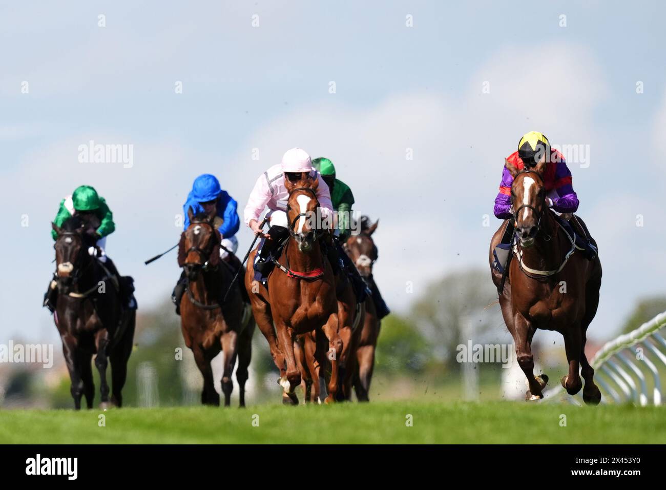 The African Queen ridden by Joe Fanning (right) on their way to winning the British Stallion Studs EBF Fillies' Handicap at Brighton Racecourse. Picture date: Tuesday April 30, 2024. Stock Photo