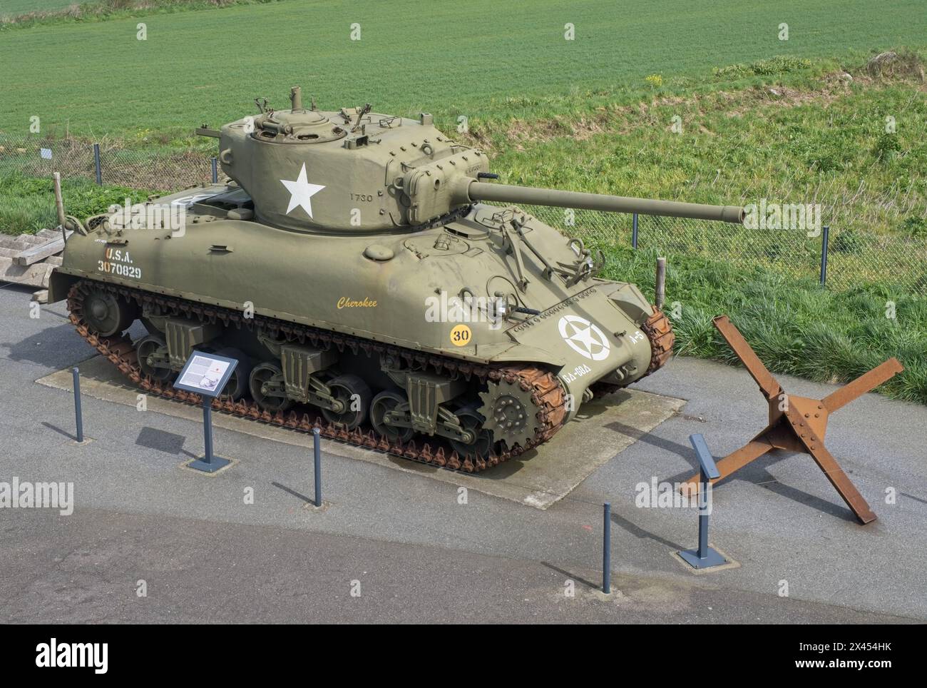 Plougonvelin, France - Apr 7, 2024: Sherman M4A1 76W tank. Graf Spee Battery Fire Control Post during the Second World War. Sunny spring day. Selectiv Stock Photo