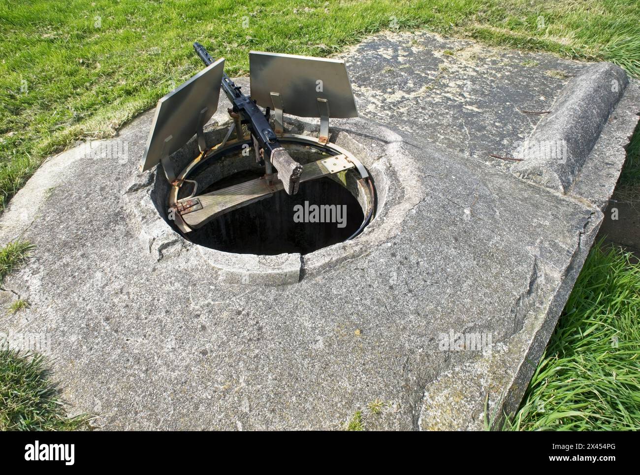 Plougonvelin, France - Apr 7, 2024: MG42 machine gun nest. Graf Spee Battery Fire Control Post during the Second World War. Sunny spring day. Selectiv Stock Photo