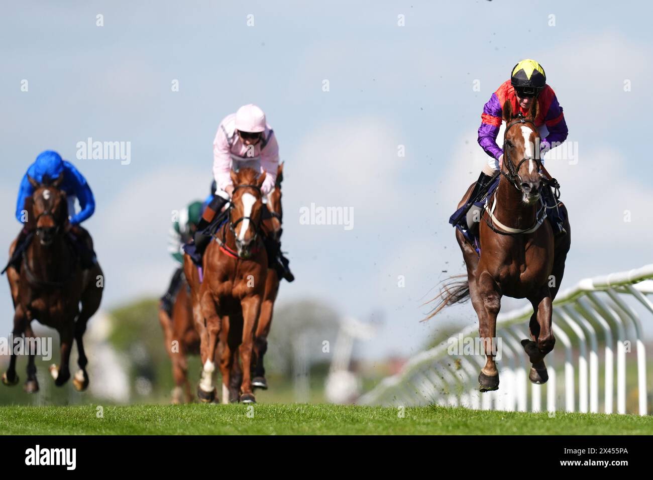 The African Queen ridden by Joe Fanning (right) on their way to winning the British Stallion Studs EBF Fillies' Handicap at Brighton Racecourse. Picture date: Tuesday April 30, 2024. Stock Photo