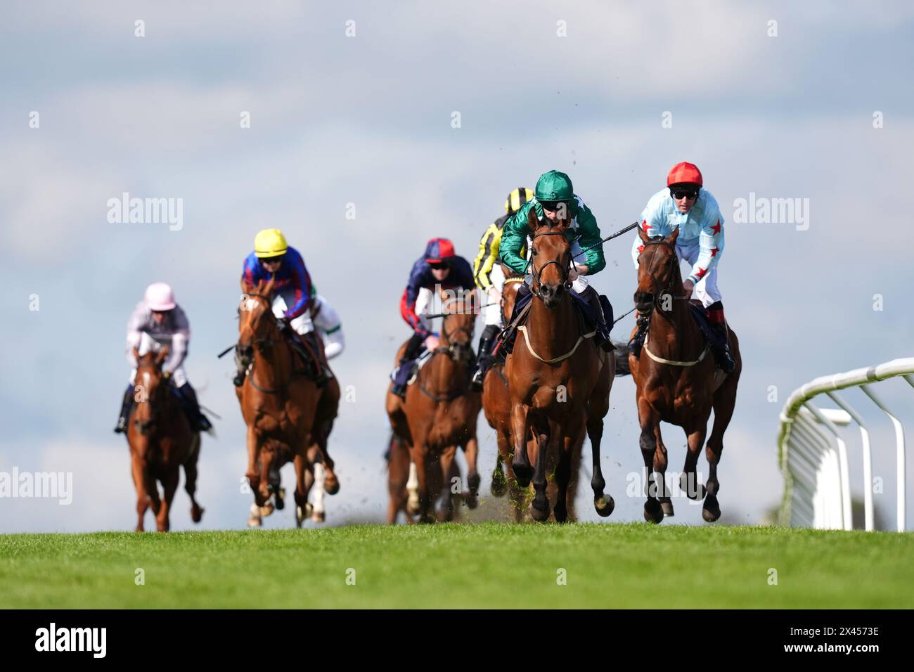 Elforleather ridden by Edward Greatrex (second right) on their way to winning the Old Ship Brightons Oldest Hotel Handicap at Brighton Racecourse. Picture date: Tuesday April 30, 2024. Stock Photo