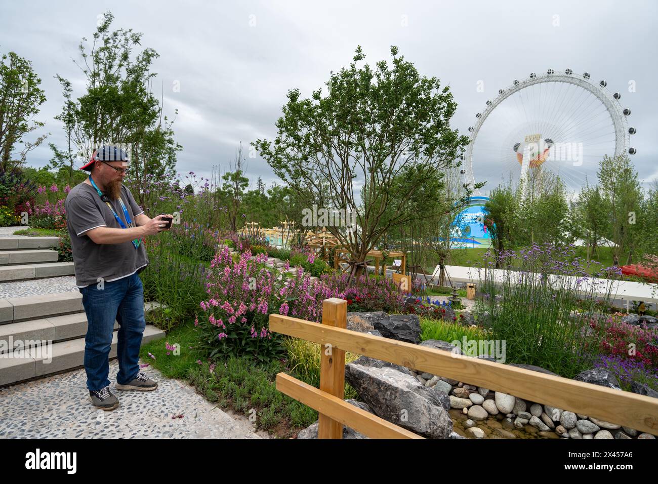 Chengdu. 29th Apr, 2024. Chad Sinclair takes photos of exhibits at the
