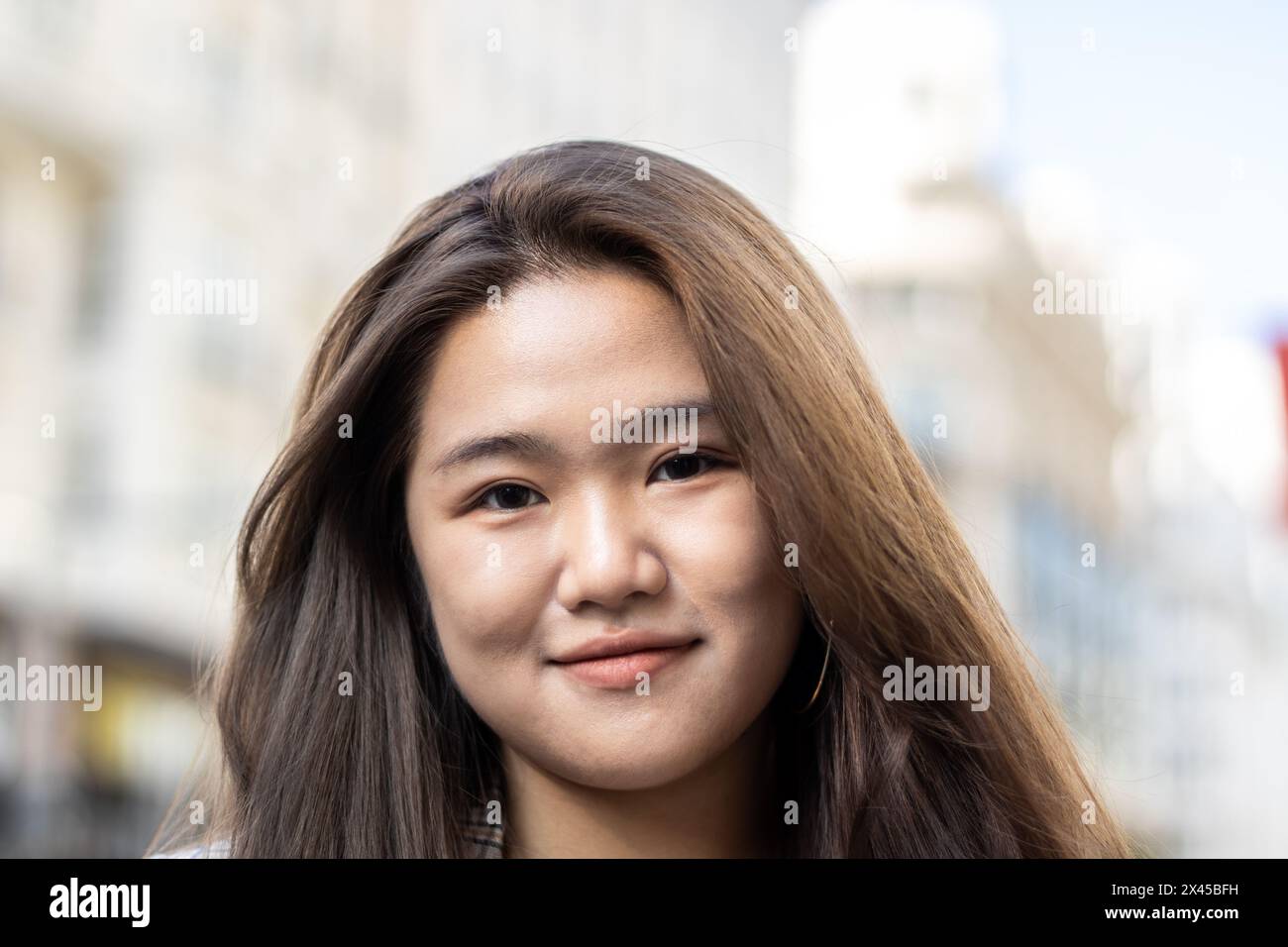 Woman with asian features hi-res stock photography and images - Alamy