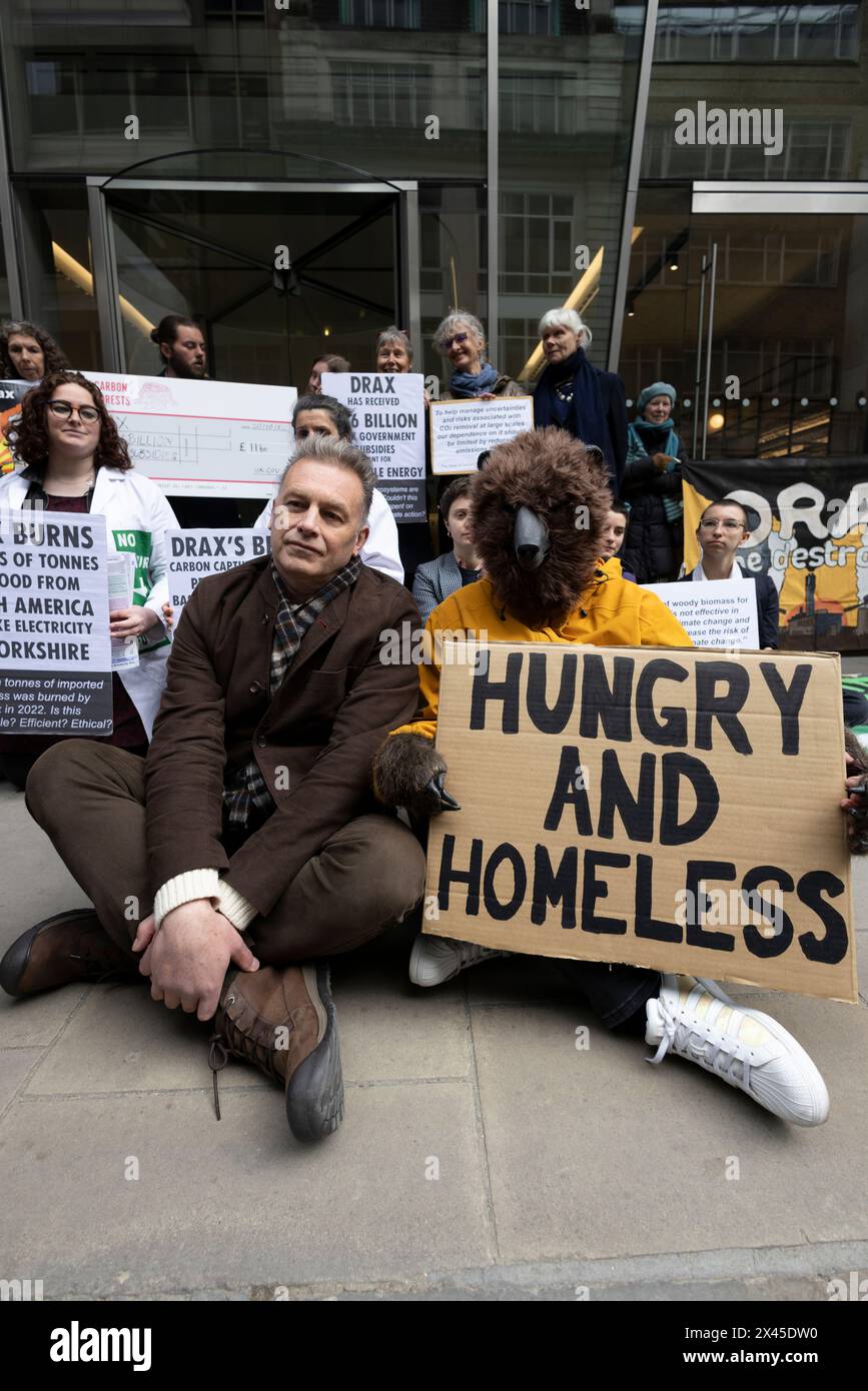 Chris Packham leads protests against Drax over environmental 'destruction' Broadcaster Chris Packham joined protesters outside the AGM in London, UK Stock Photo