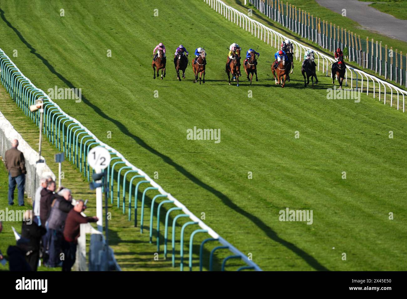 Voodoo Ray ridden by Tom Queally (third right) on their way to winning the Brightons Antiques, Collectables And Vintage Fair Handicap at Brighton Racecourse. Picture date: Tuesday April 30, 2024. Stock Photo