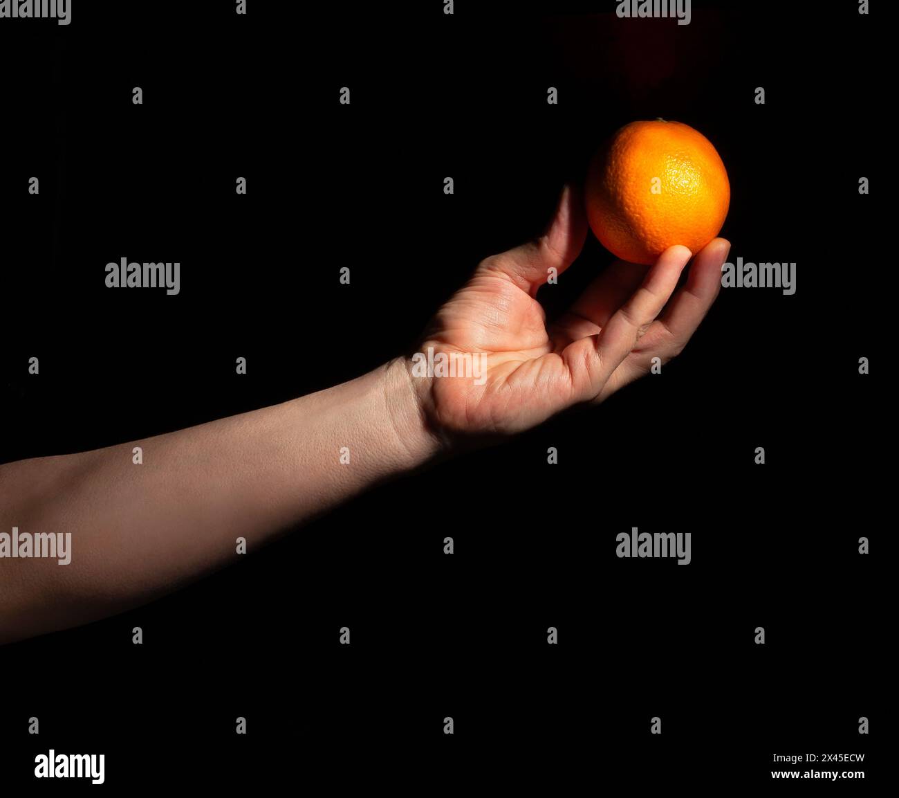 Orange in black background hi-res stock photography and images - Alamy