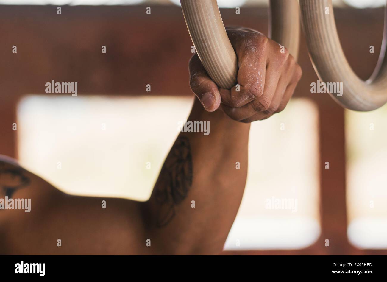 man hand holding a gymnastic ring. close-up Stock Photo