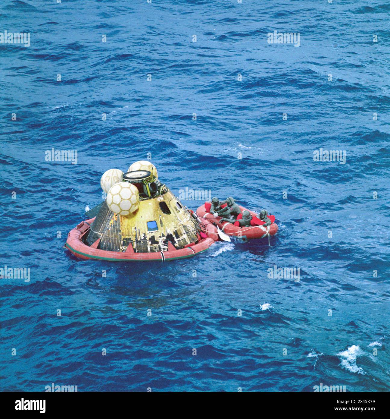 Apollo 11 command module Columbia with astronauts Neil Armstrong, Michael Collins, and Buzz Aldrin aboard splashed down at 11:49 a.m. CDT, July 24, 19 Stock Photo