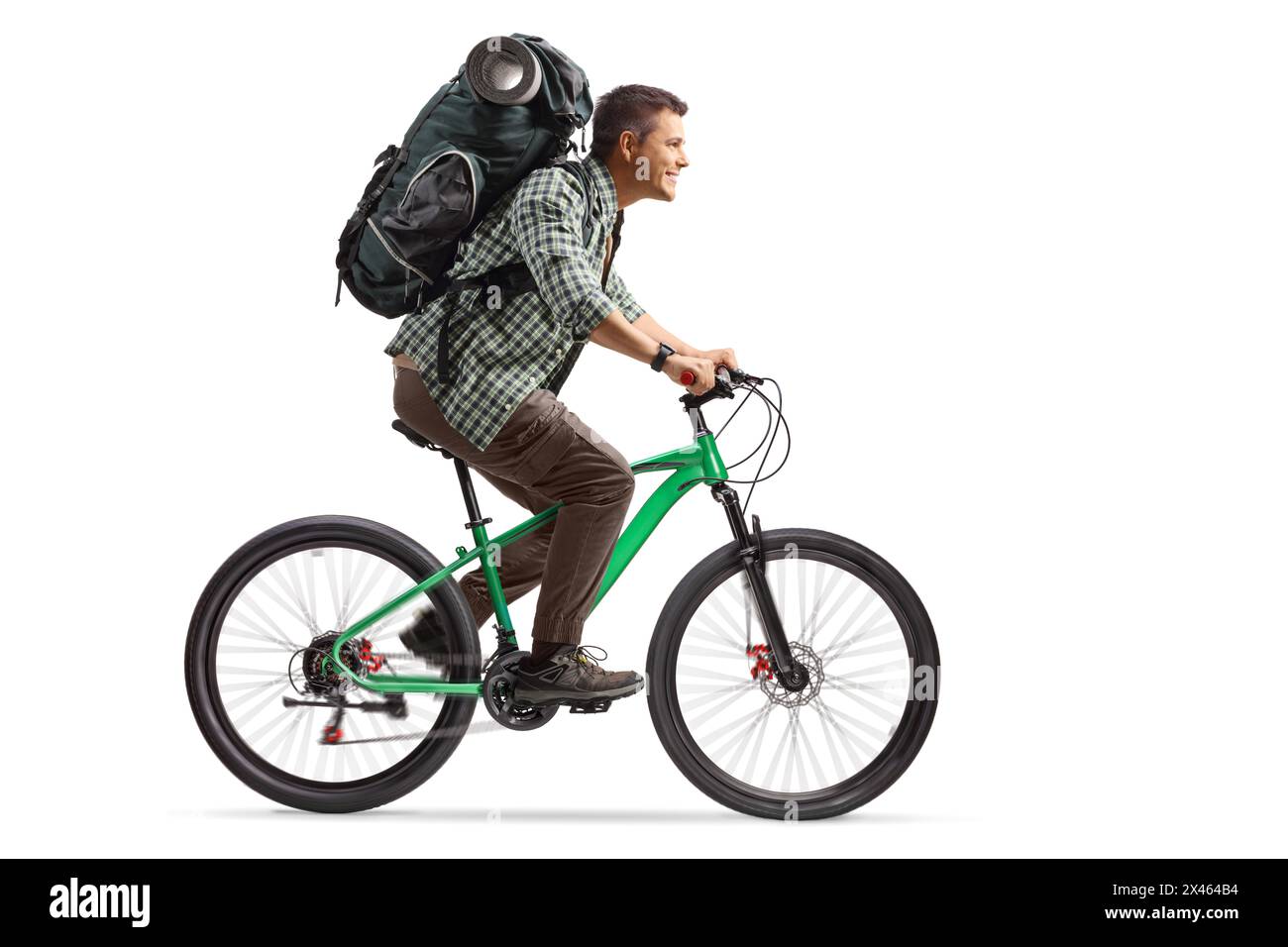 Backpack Riding Position Full length profile shot of a man with a backpack riding a bicycle ...