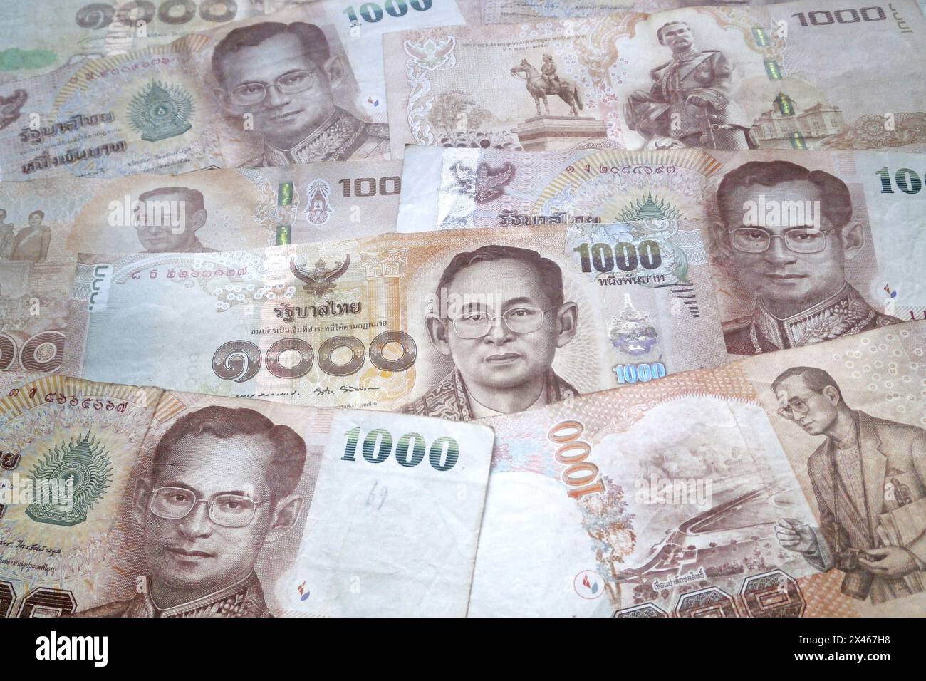 Stack of Thai baht banknotes as background. Stock Photo