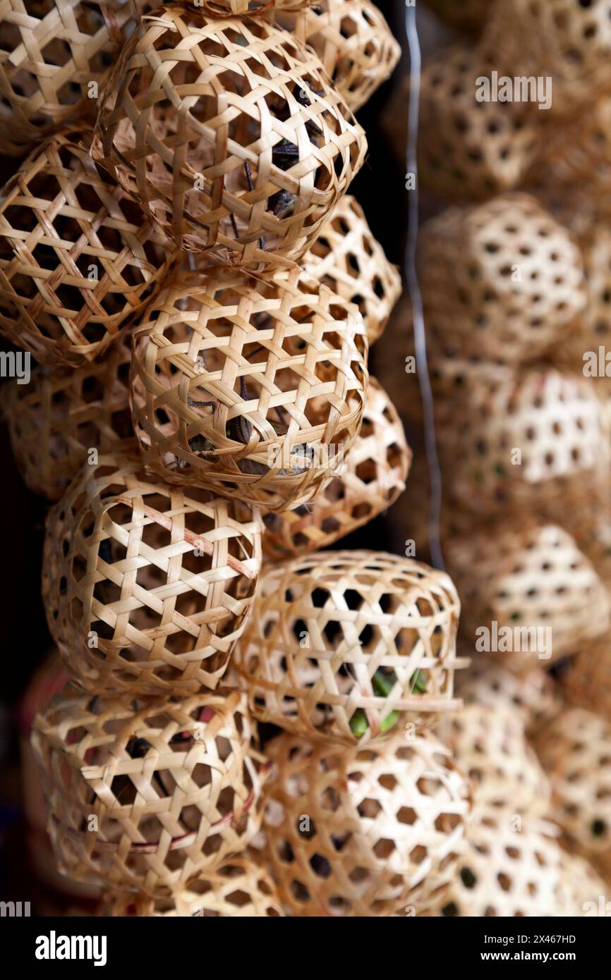 Bamboo cages with crickets at the Birds and Crickets market in Shanghai. Stock Photo