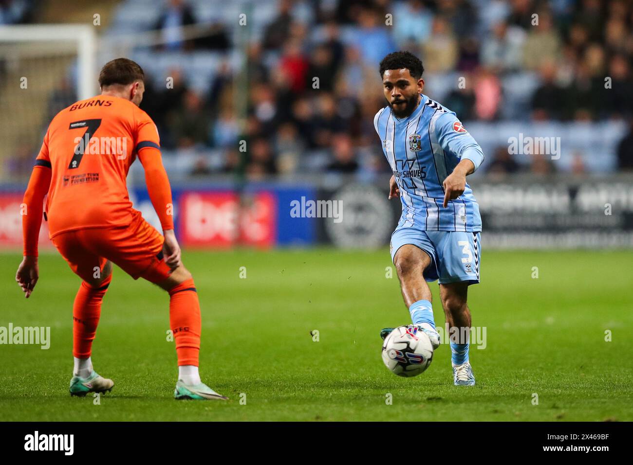 Jay Dasilva of Coventry City passes the ball during the Sky Bet Championship match Coventry City vs Ipswich Town at Coventry Building Society Arena, Coventry, United Kingdom, 30th April 2024  (Photo by Gareth Evans/News Images) Stock Photo