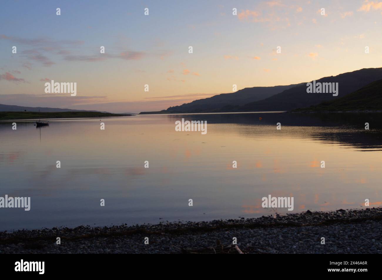 Sunset  over a calm Loch Beg on the Isle of Mull, Scotland, UK Stock Photo