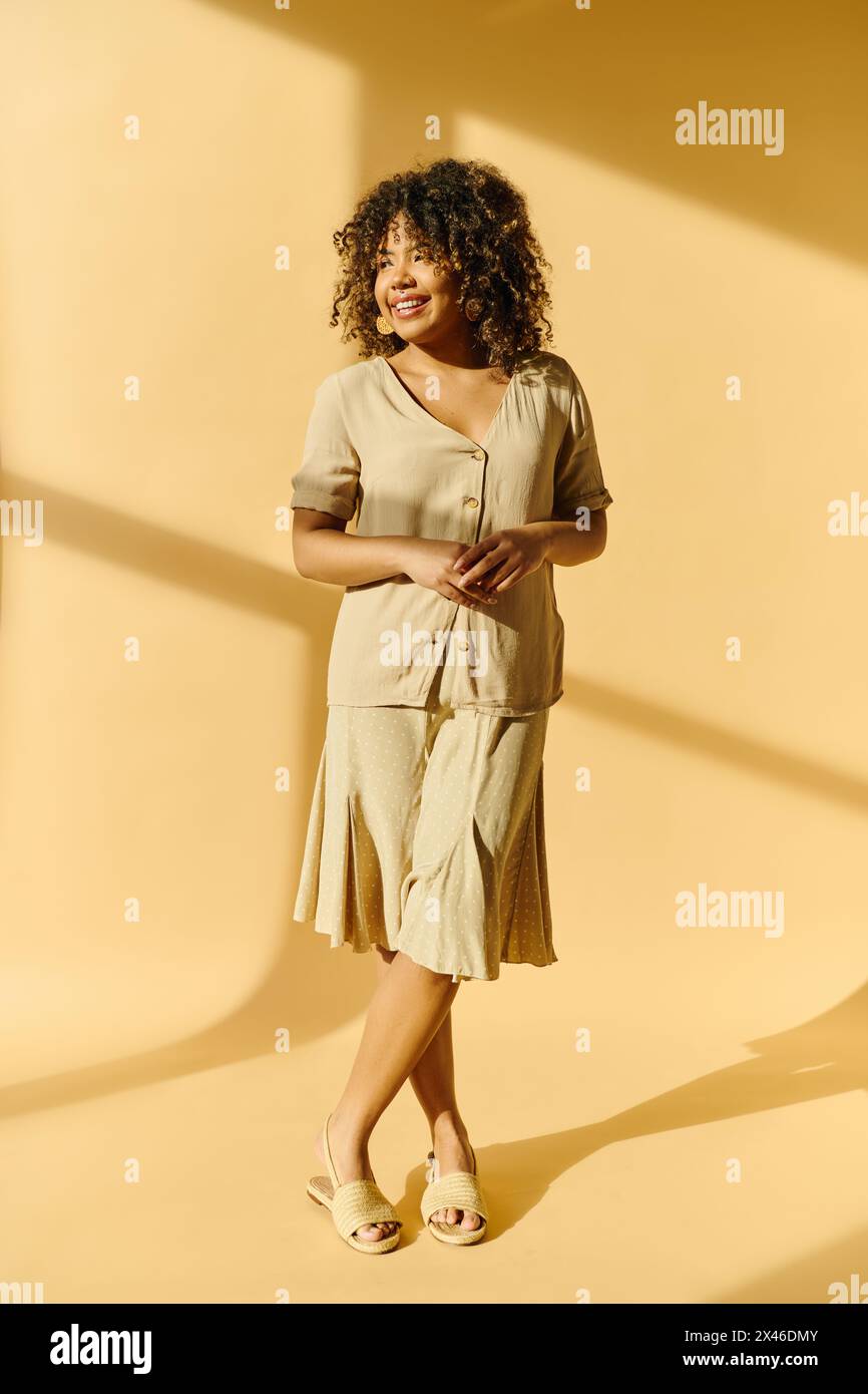 Tall young black woman standing hi-res stock photography and