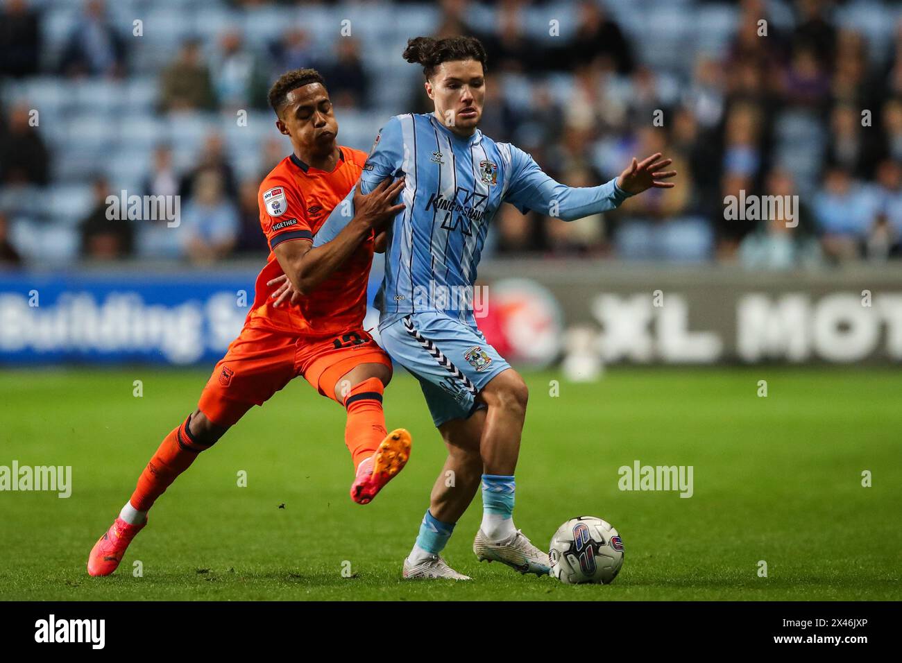 Callum O'Hare of Coventry City goes forward with the ball during the Sky Bet Championship match Coventry City vs Ipswich Town at Coventry Building Society Arena, Coventry, United Kingdom, 30th April 2024  (Photo by Gareth Evans/News Images) Stock Photo