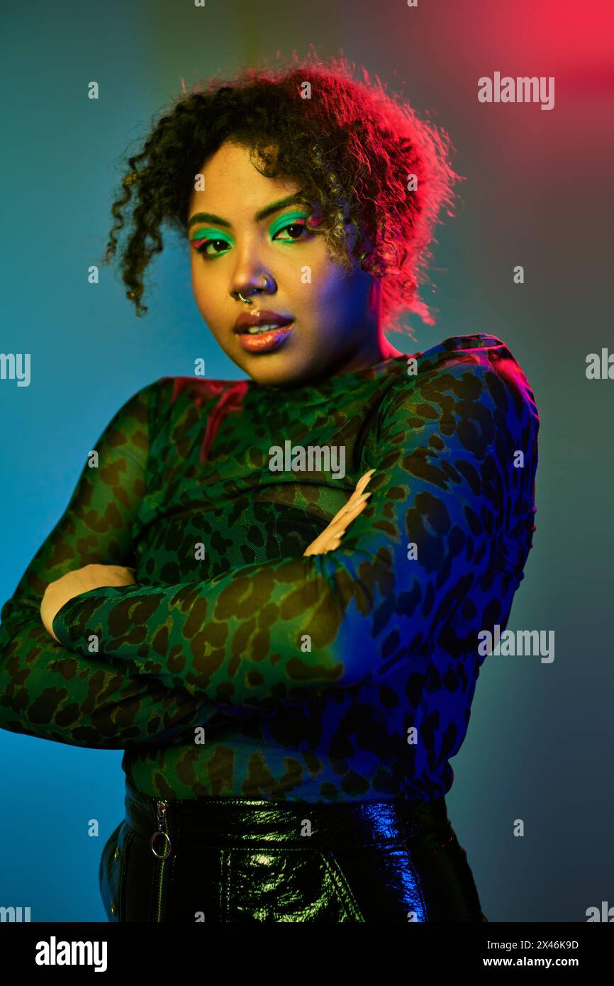 African American woman with curly hair and green eyes poses gracefully ...