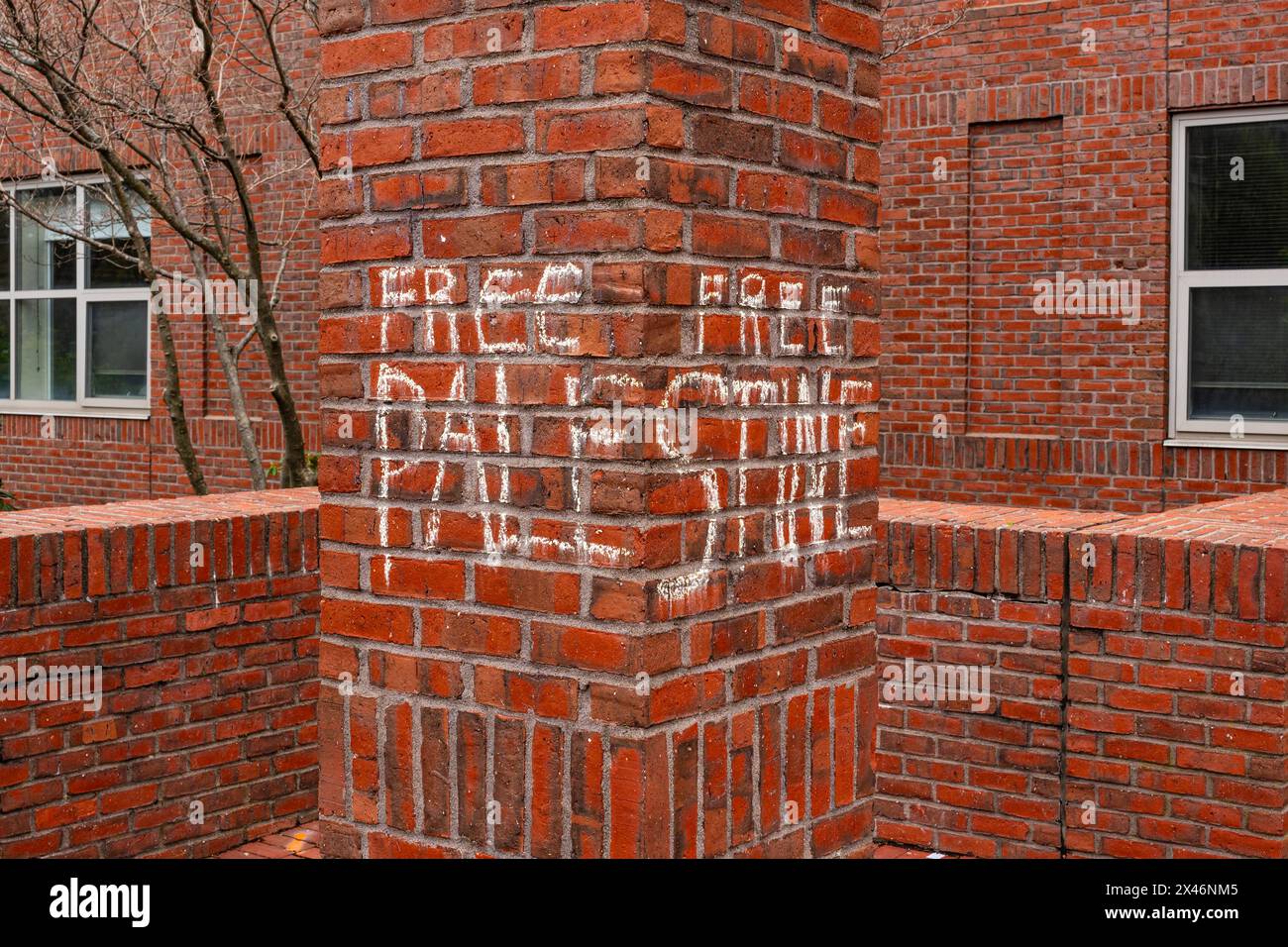Medford, MA, US-April 30, 2024: Sign reading Free Palestine spray painted on university building by Pro-Palestinian protesters at the Tufts University Stock Photo