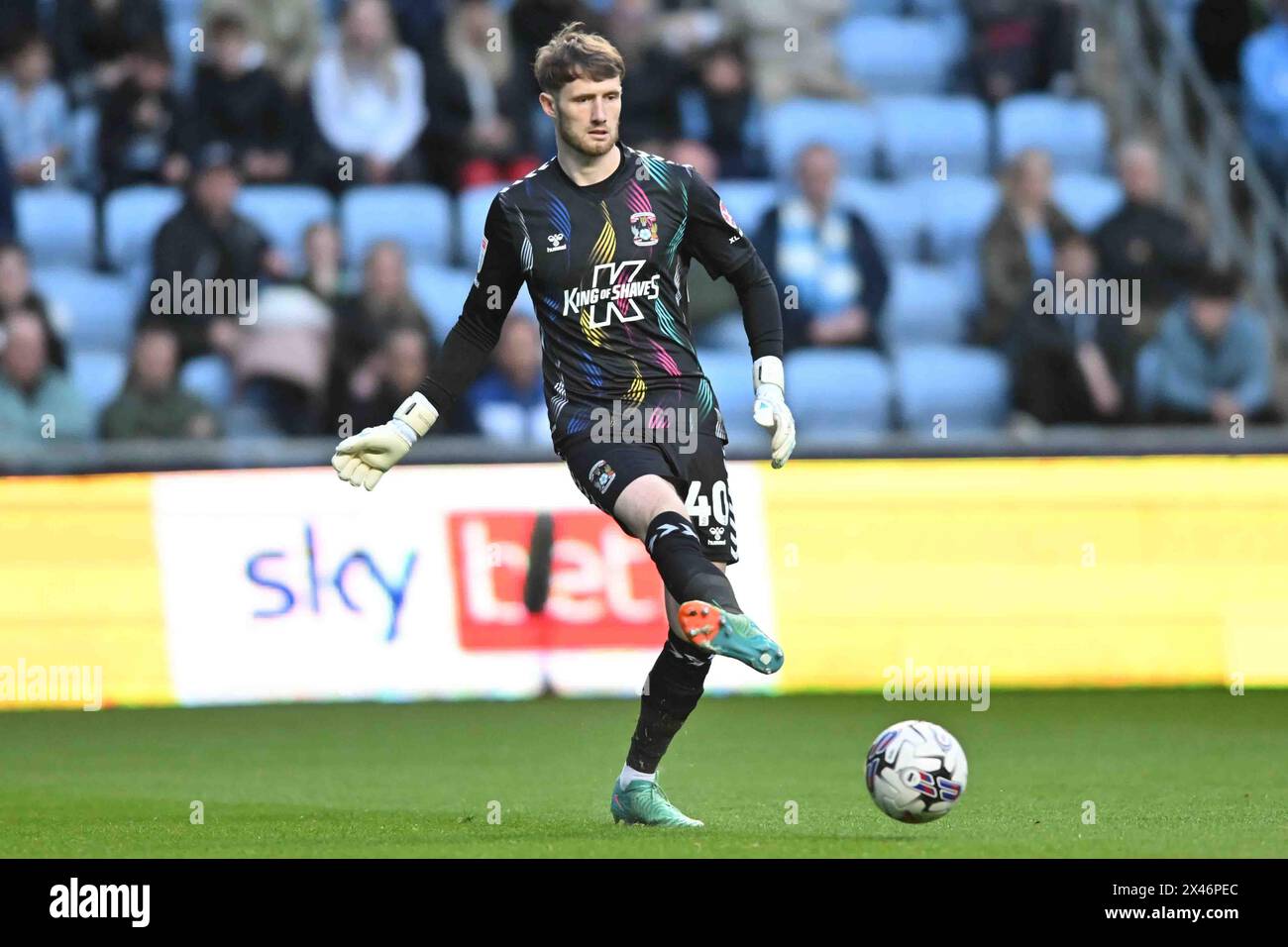 Goalkeeper Bradley Collins (40 Coventry City) Passes the ball during the Sky Bet Championship match between Coventry City and Ipswich Town at the Coventry Building Society Arena, Coventry on Tuesday 30th April 2024. (Photo: Kevin Hodgson | MI News) Credit: MI News & Sport /Alamy Live News Stock Photo