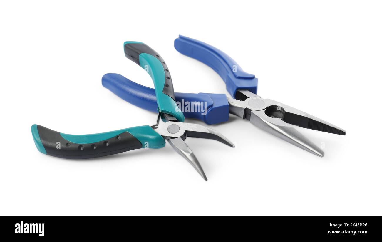 Different pliers isolated on white. Construction tool Stock Photo