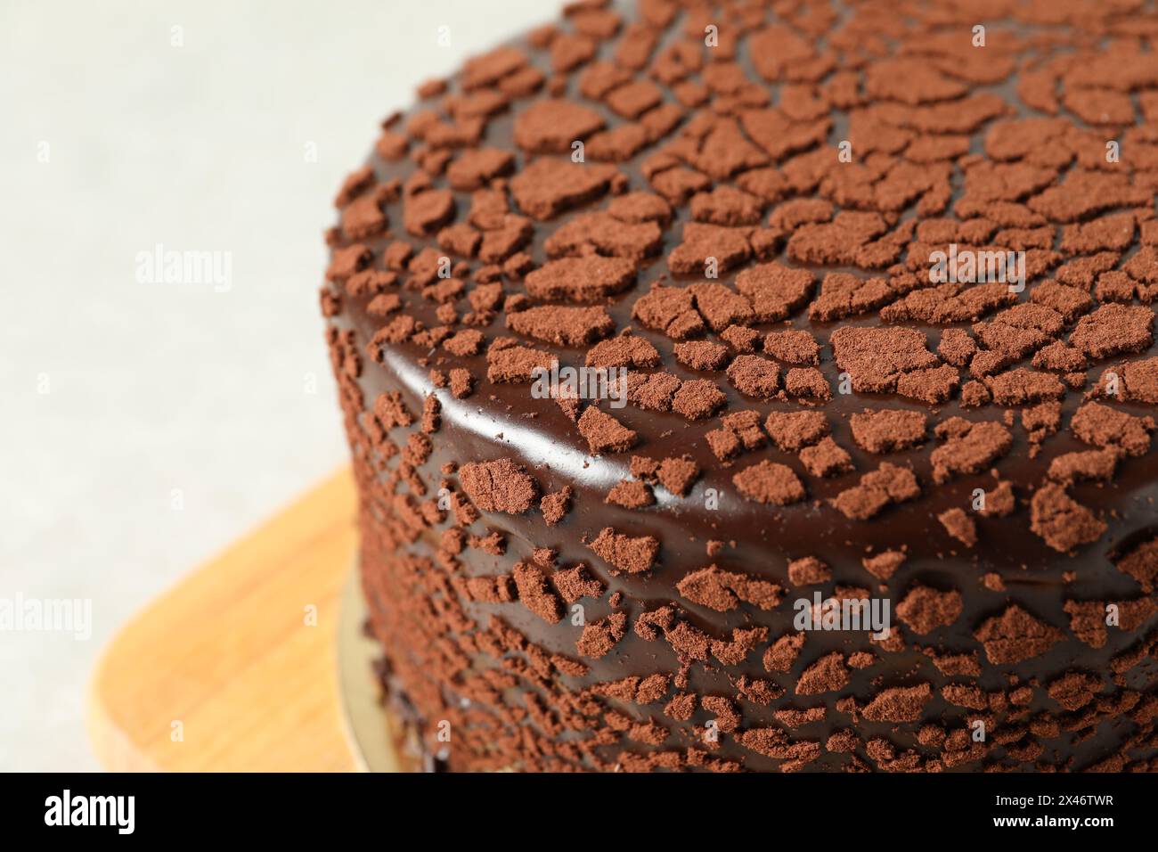Delicious chocolate truffle cake on table, closeup Stock Photo