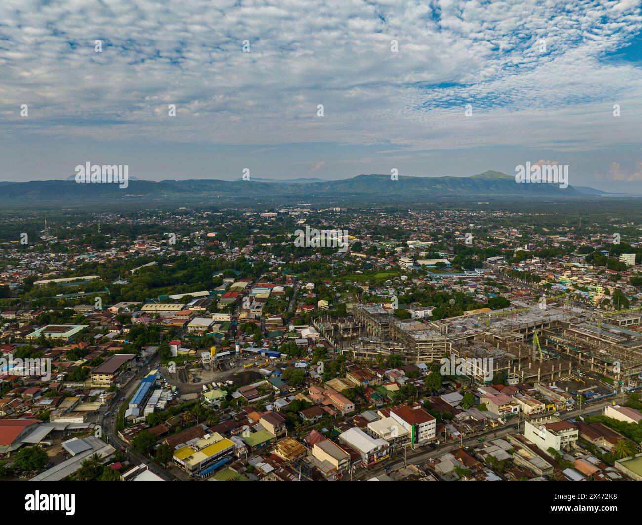 Cityscape: Cotabato City, beautiful urban city at daytime. Blue sky and clouds. Mindanao, Philippines. Stock Photo